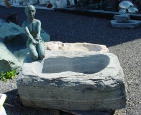 Skulptur Brunnen Stein Naturstein Gartenbrunnen Steinmetz Vorarlberg