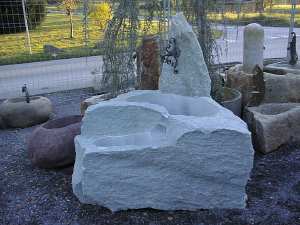 Brunnen Stein Naturstein Gartenbrunnen Steinmetz Vorarlberg