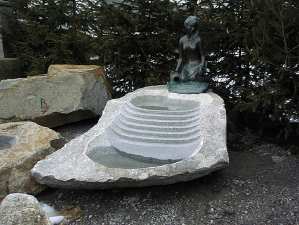 Brunnen Stein Naturstein Treppenbrunnen Gartenbrunnen Steinmetz Vorarlberg